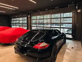 CHI Full-View aluminum garage door with clear glass, interior view from luxury garage.