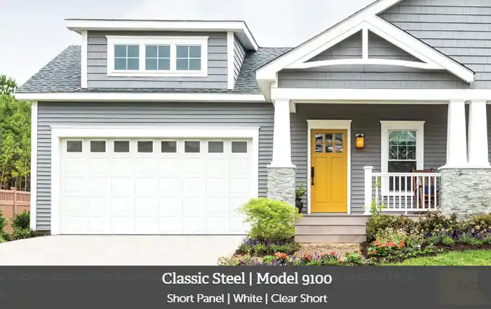 Wayne Dalton Model 9100 white short-panel garage door with Clear Short windows, installed on a modern gray home with a yellow front door.